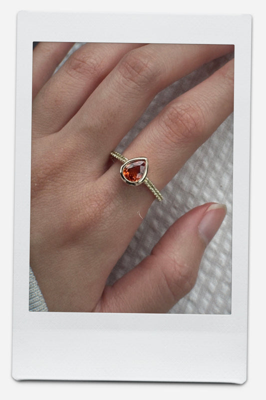 Alison Lin bezel set pear ring