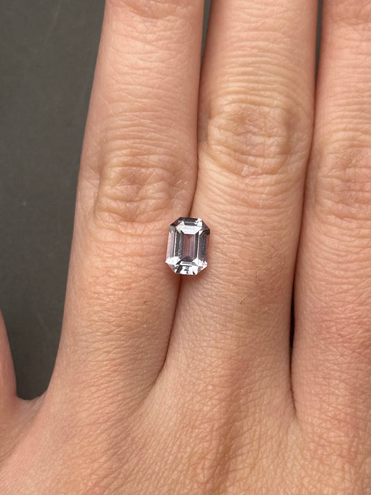 greyish white emerald cut sapphire - 1.25 ct