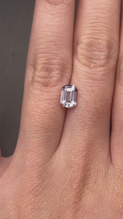 greyish white emerald cut sapphire - 1.25 ct